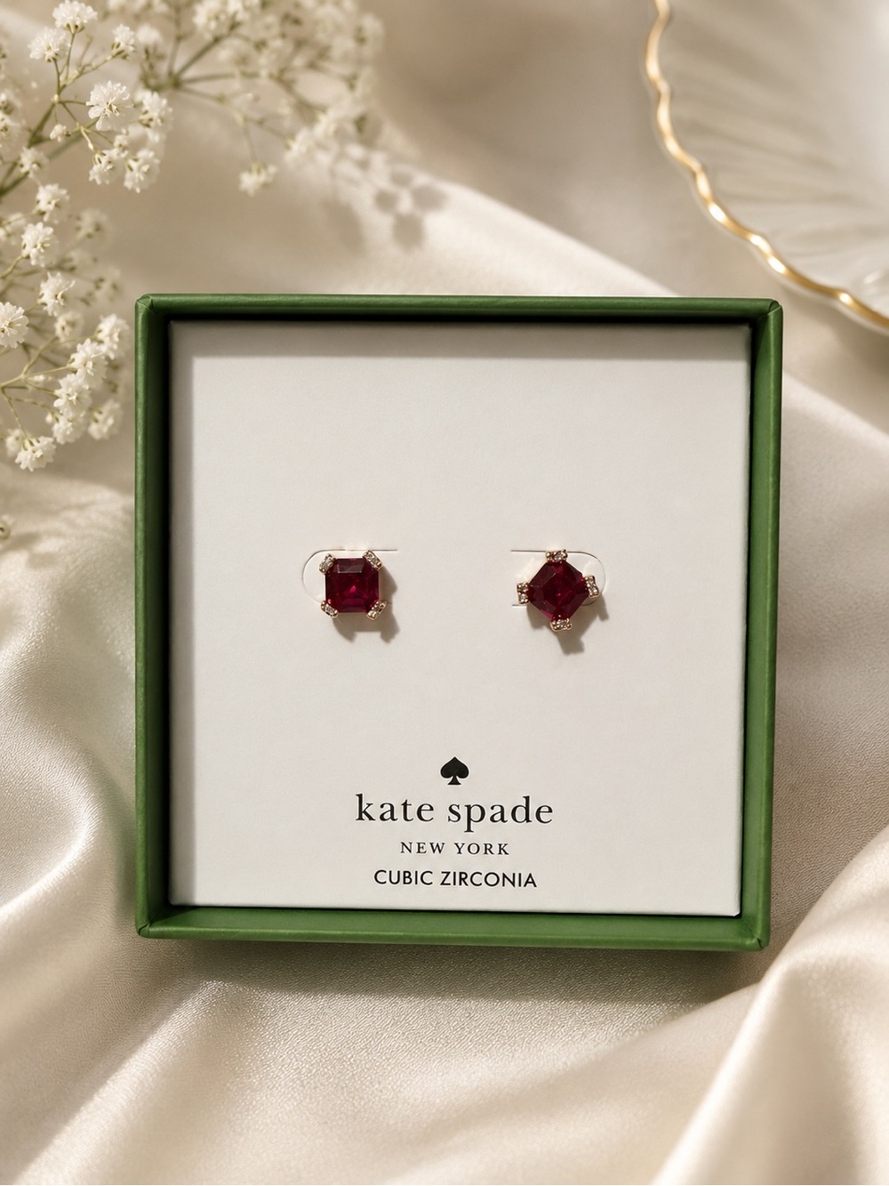 Kate spade stud ruby color with rose gold earrings